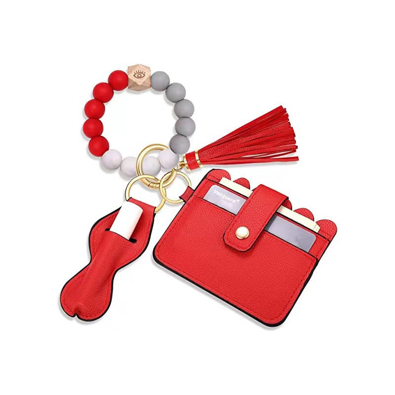 Venta al por mayor Titular de la tarjeta Pulsera de borla Llavero de silicona